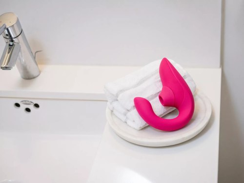 Vibrátor s pulzační stimulací klitorisu Womanizer Blend